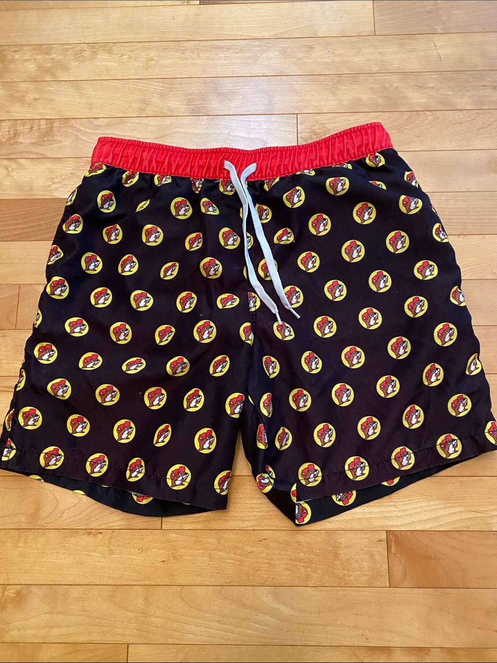 Men's Buc-red Black Swim Trunks with Red Waistband and Yellow Accent Print